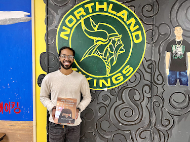 Nylin Gatewood with book